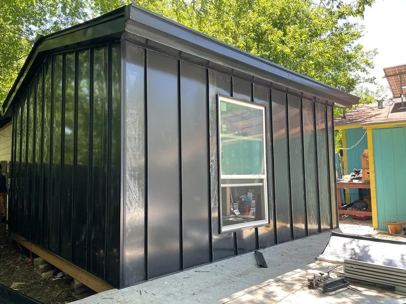 Black standing seam metal wall panels for Metal Roof Installation in Greenwood